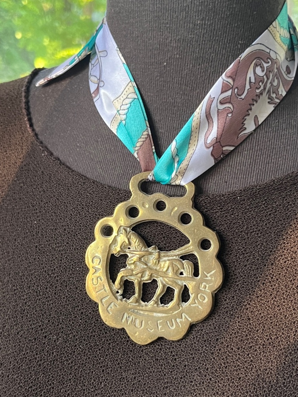 Castle Museum York Brass Horse Medallion on Patterned Silk Ribbon